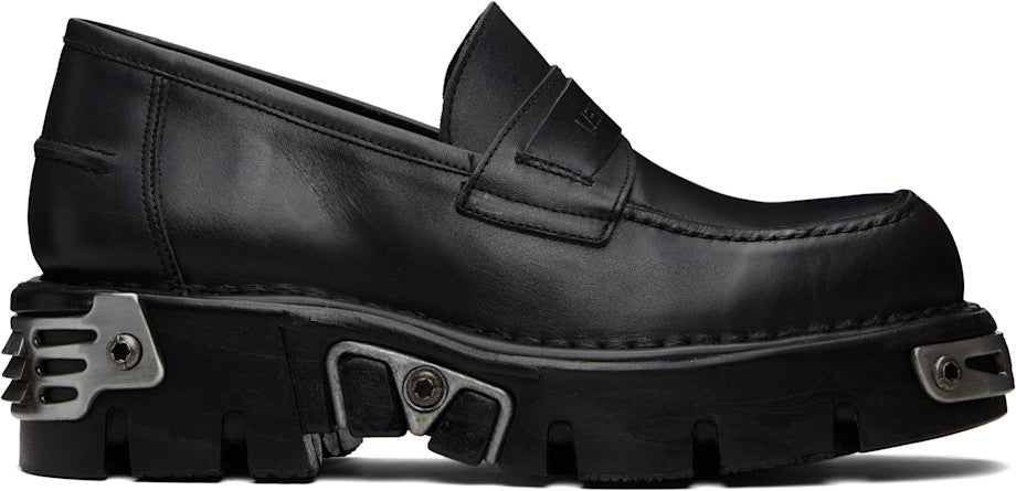 VETEMENTS
Flâneurs noirs à ferrures en métal édition New Rock